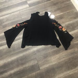 Umgee cut our floral sleeve top